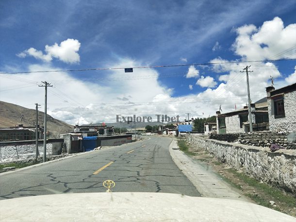 Crossing the village near Sakya