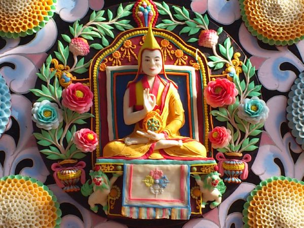 A carving of Buddha as the centerpiece of a Butter Sculpture display