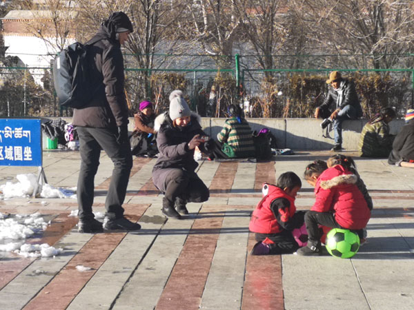 Tourists are interacting with locals and experiencing the local culture