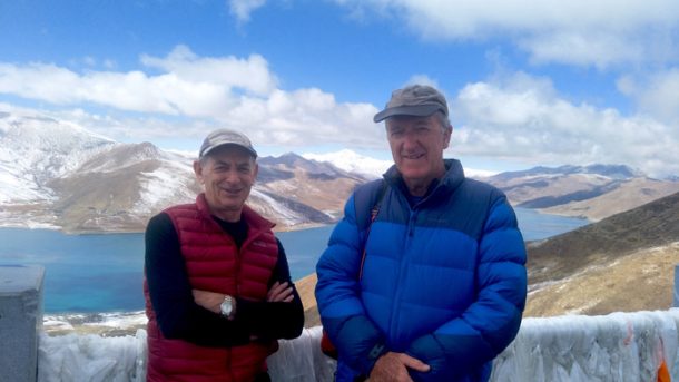 Clients enjoy the view of Yamdrok lake in Tibet