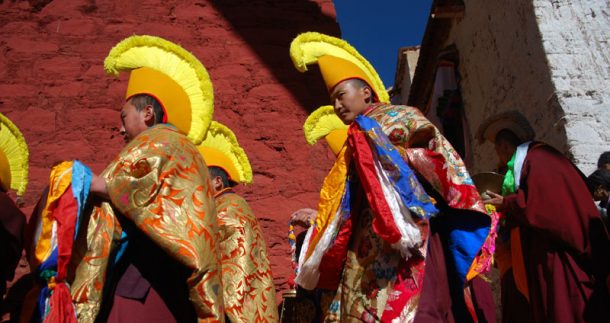 Tibetan buddhist monks preparing for puja
