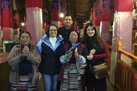 Travelers with local Tibetans in Lhasa