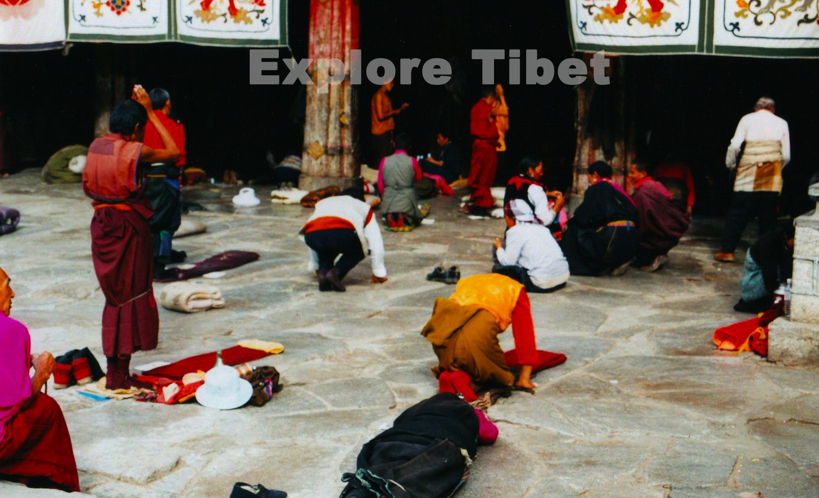 Prostrating near Jokhang Temple at Barkhor Street -Explore Tibet