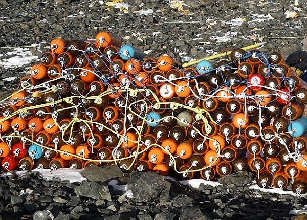 A haul of oxygen containers from one trip by volunteers demonstrates the huge scale of dumping trash on Everest