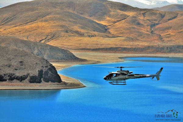 An emergency helicopter flies over Nam Co Lake in the Tibet Autonomous Region.