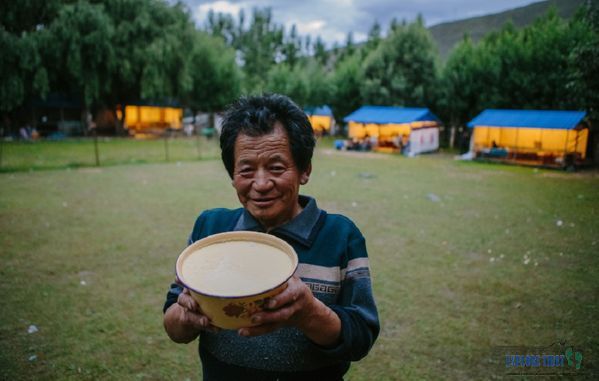 Tibetans make their unique yak-milk yogurt to eat and enjoy at the annual Shoton Festival.