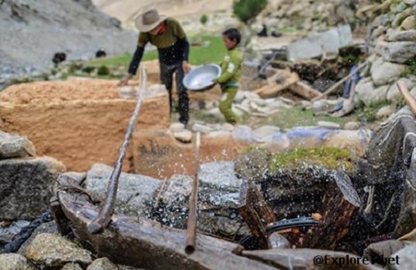 One of the many water wheels used to grind the Juniper for incense in Thonba Village.