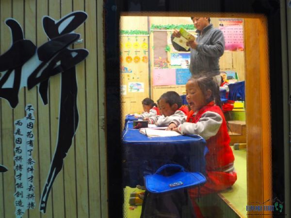 Students learning in the new classrooms at the Lawugan Village Primary School