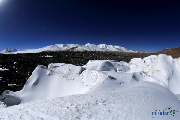 A melted area in the glacier that was previously part of the ice-flow