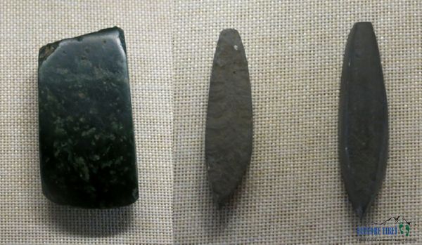 A jade axe head and stone chisels from the Late Neolithic found in Nyingchi
