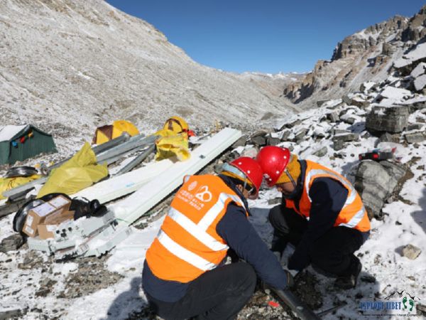 China Mobile workers putting up the base stations around the base of Mount Everest at 5,300 meters